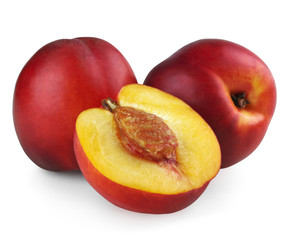 Two nectarines with half