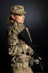 Army girl with rifle