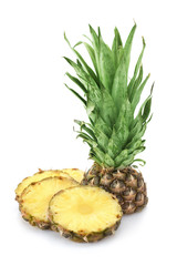 Ripe pineapple with lush green leaves