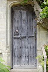 Old wooden doorway to mansion house