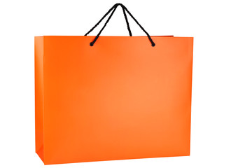 Bright isolated orange shopping bag with black handles lifted.