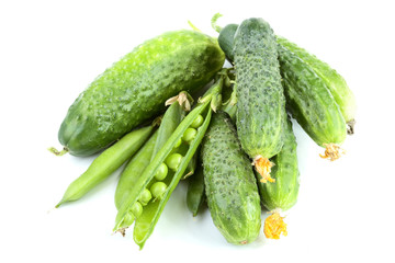 Green cucumbers and peas isolated