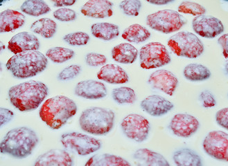 a dessert- a lot of strawberry in milk