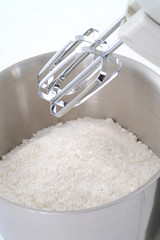mixing a cup of flour