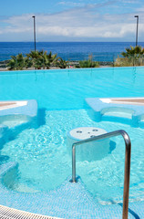 Swimming pool with jacuzzi at luxury hotel, Tenerife island, Spa