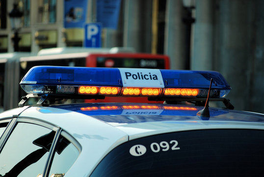 siren on a night patrol car in barcelona, spain