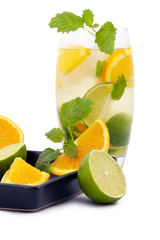 Delicious cold cocktail, fruit and mint ice.