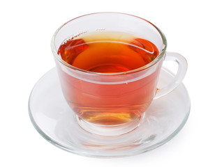 Glass cup with a camomile tea