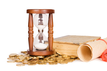 Hourglasses and book isolated on white