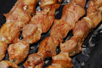 Pork pieces baked on a brazier