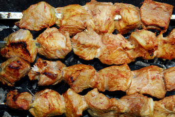 Pork pieces baked on a brazier