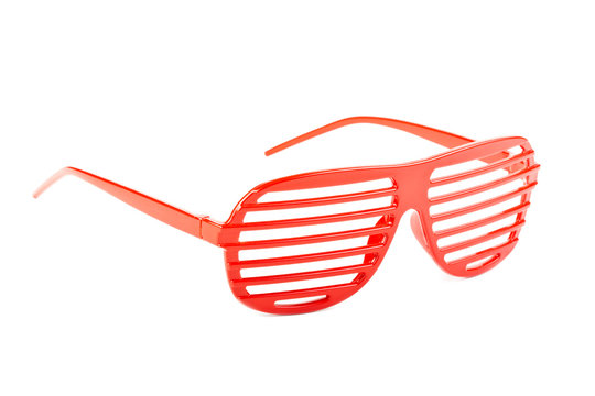 red plastic shutter shades sunglasses isolated on white
