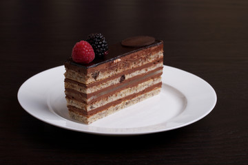 Chocolate cake with a raspberry and blackberry