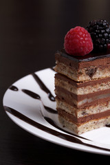 Chocolate cake with a raspberry and blackberry