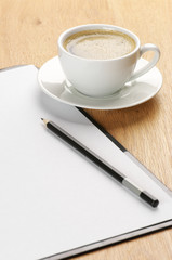 Clipboard and coffee