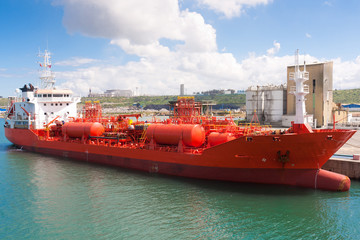 Chemical tanker moored in port - obrazy, fototapety, plakaty