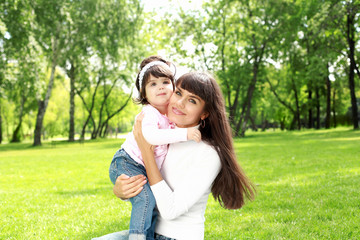 Mother with her daughter outside