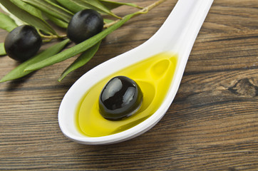 Spoon with black olive