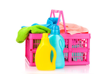 Detergents and towels in basket isolated on white