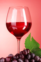 Wine glass on red background