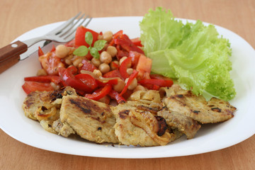 Fried pork with salad