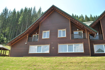 wooden houses near chair lift