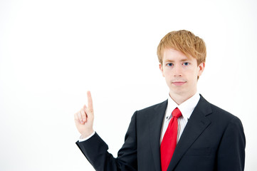 a portrait of young businessman pointing