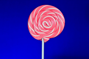 Lovely lollipop with pink and white stripes.