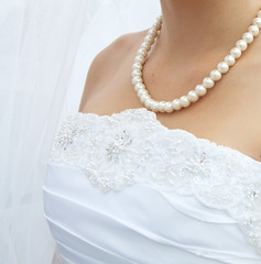 pearls on neck Bride