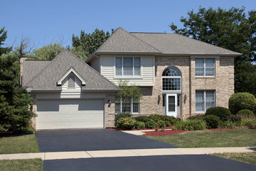 Brick home with arched front windows