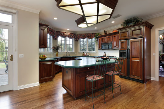 Kitchen with green island counter