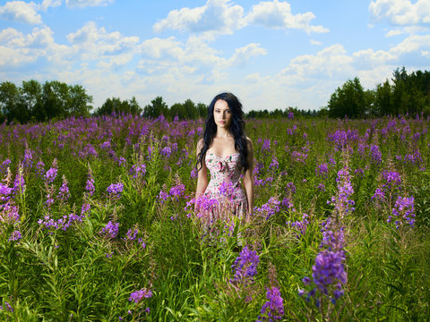 Lady in a flower meadow