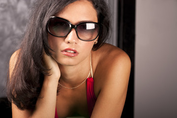 Fototapeta premium Pretty young girl in sun glasses