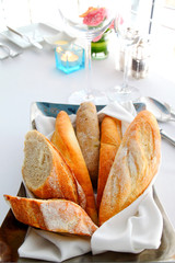 Sliced baguette served on the table