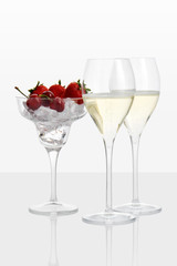 view of glasses with sparkling wine and strawberry
