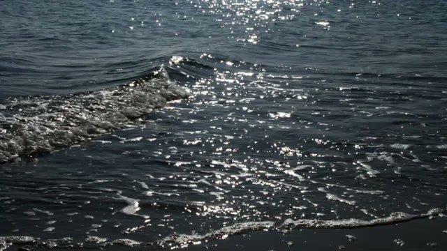 Beautiful breakers with reflections of the sun