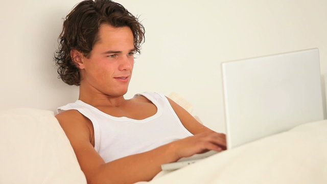 Handsome guy with notebook