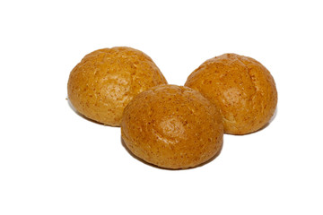 Loaf of bread and rolls isolated on white