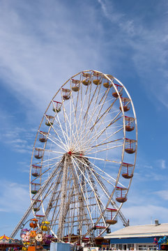 Fairground Wheel against a blue summer sky
