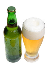 beer is in a bottle and glass