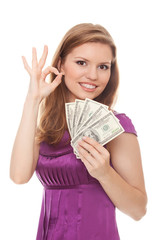 Woman holding 500 dollars and showing sign OK