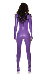 Sexy Female Wearing Purple Shiny Catsuit in The Studio