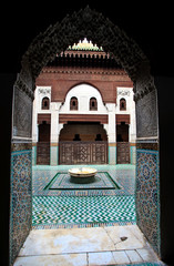 Arch doorway frames courtyard of madrasa