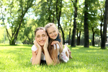 Mother with her daughter outside