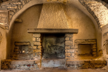 Old Fireplace in a Farmhouse Interior in Apulia, Italy