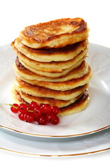 Pancakes with red currants.