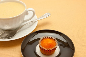 Closeup of coffee with milk in white cup