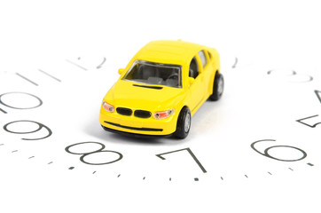 Toy car and clock face