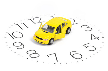 Toy car and clock face