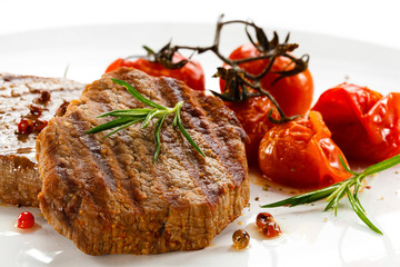 Grilled steak and fried toamtoes